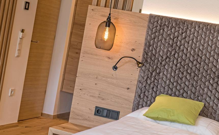 Suite Chardonnay im Garni Hotel Sonngart in Andrian mit modernem Schlafzimmer und gemütlichem Ambiente Suite Chardonnay im Garni Hotel Sonngart in Andrian mit modernem Schlafzimmer und gemütlichem Ambiente