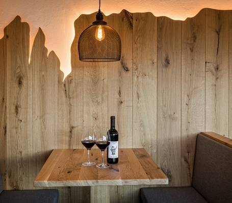 Breakfast with local wine at Sonngart Garni Hotel Andrian, South Tyrol