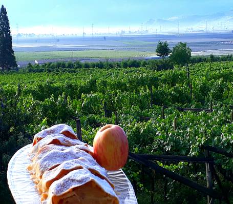 Mountain landscape in South Tyrol with sunrise and misty valley